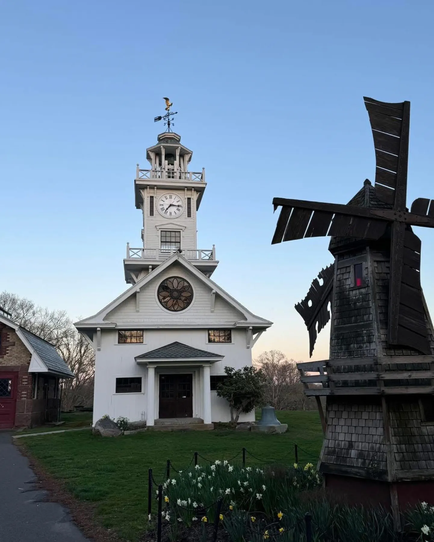 The Boothe Park Clocktower Museum and windmill across the museum grounds