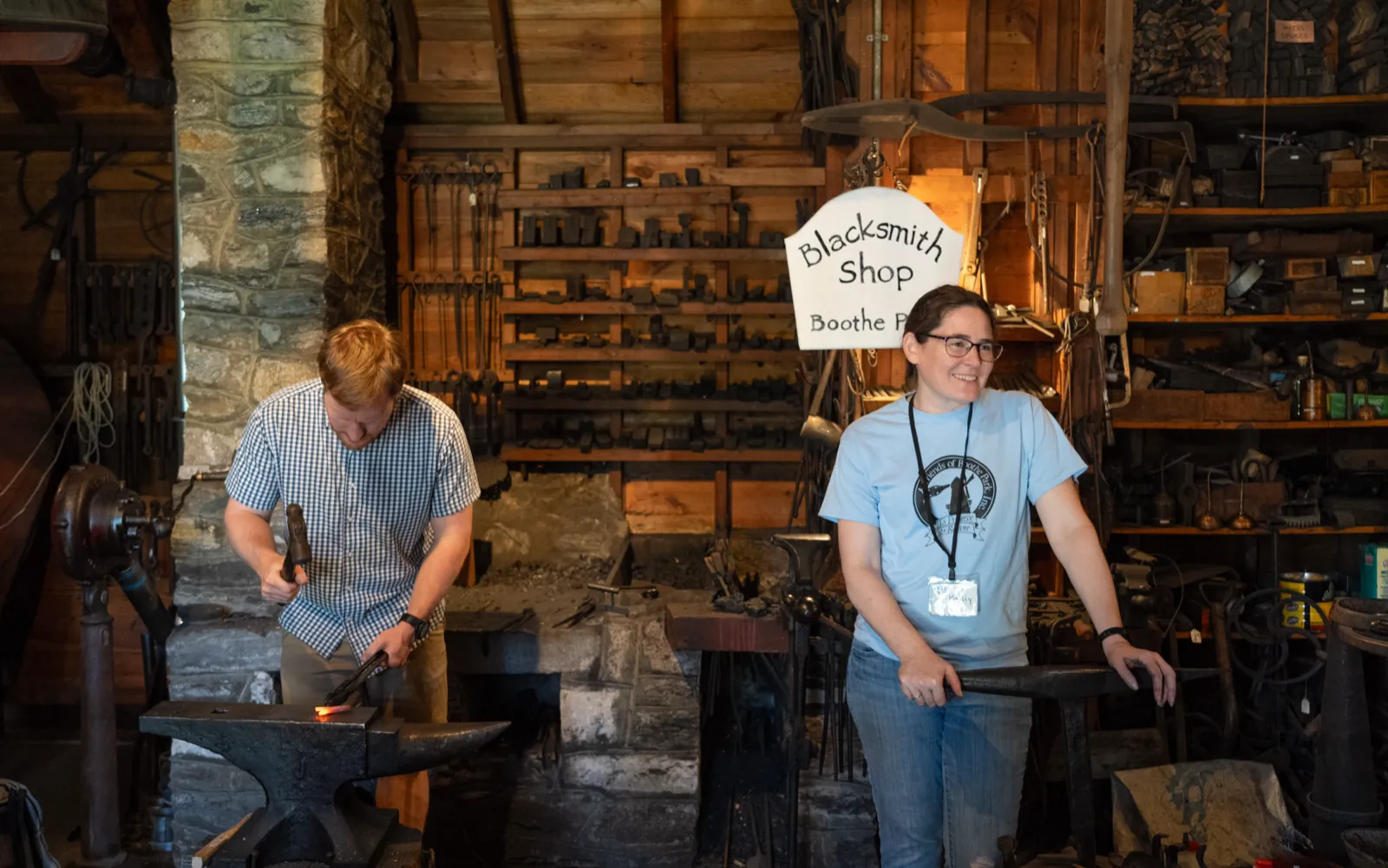 A blacksmith demonstration at the anvil inside the Boothe Park Blacksmith Shop on Opening Day