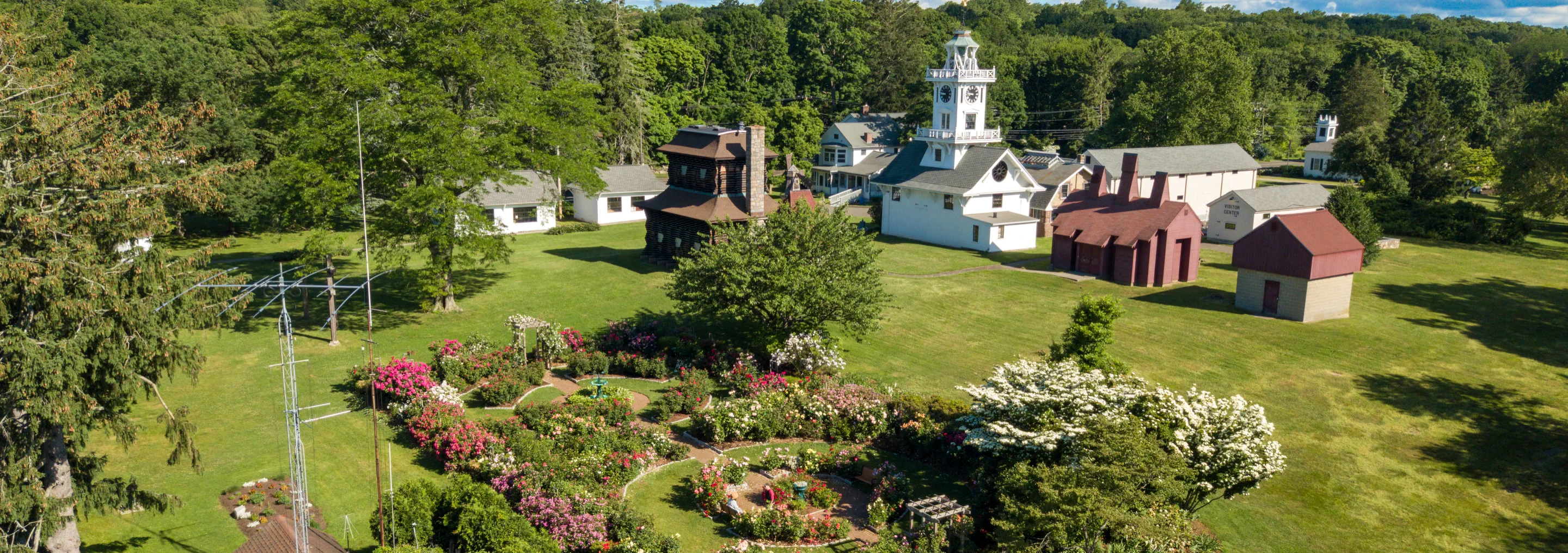 Panoramic summer aerial view of the Rose Garden and museum buildings at Boothe Memorial Park