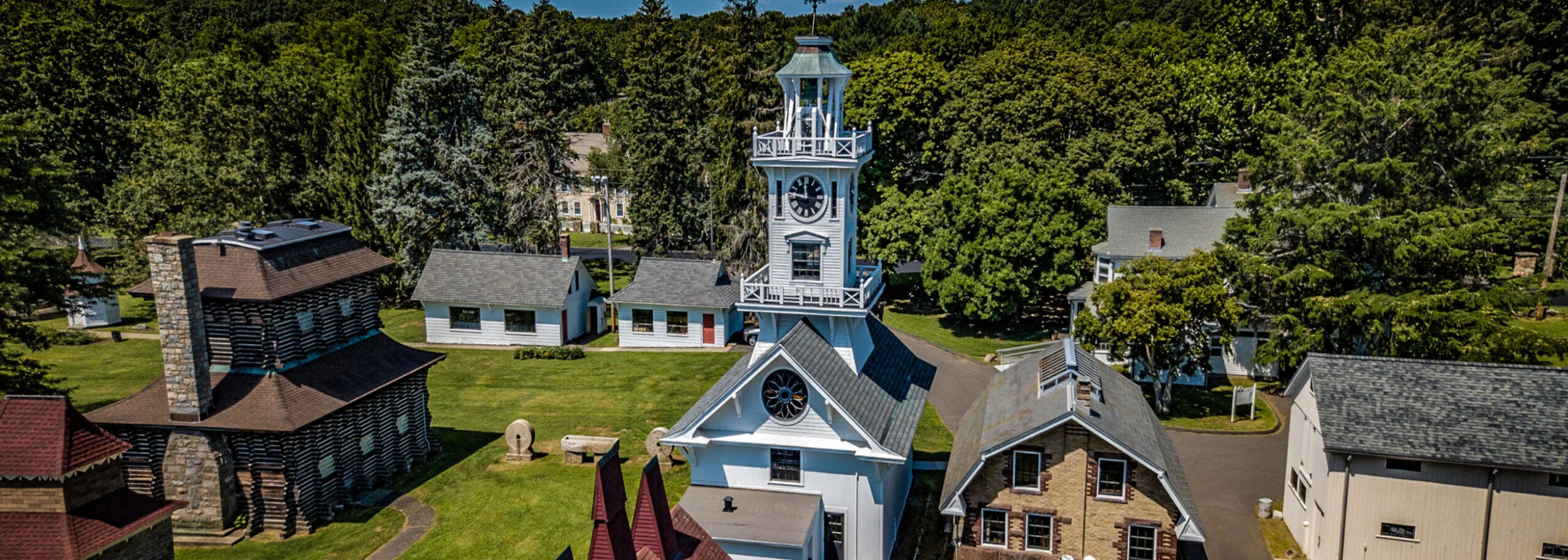 Aerial view of the Clocktower Museum and historic buildings at Boothe Memorial Park