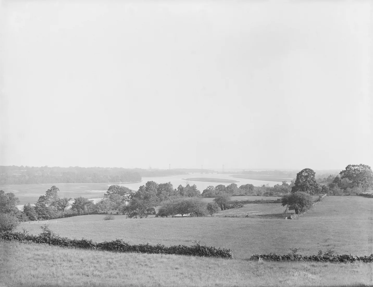 An archival glass-plate view of farm fields overlooking the Housatonic River