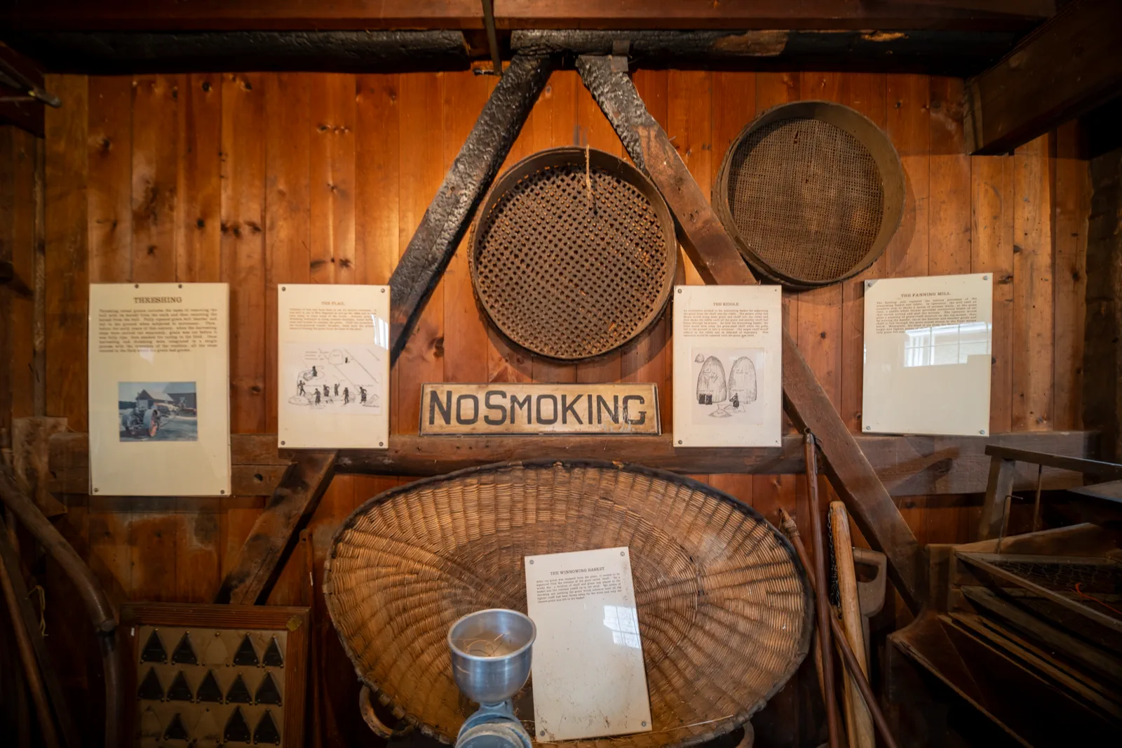 Winnowing baskets, sieves, and threshing displays inside the Americana Museum