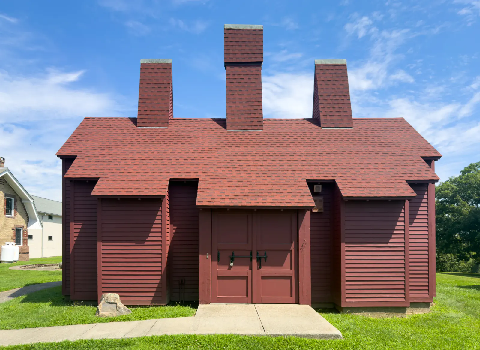 Front entrance and chimneys of the Boothe Park Blacksmith Shop