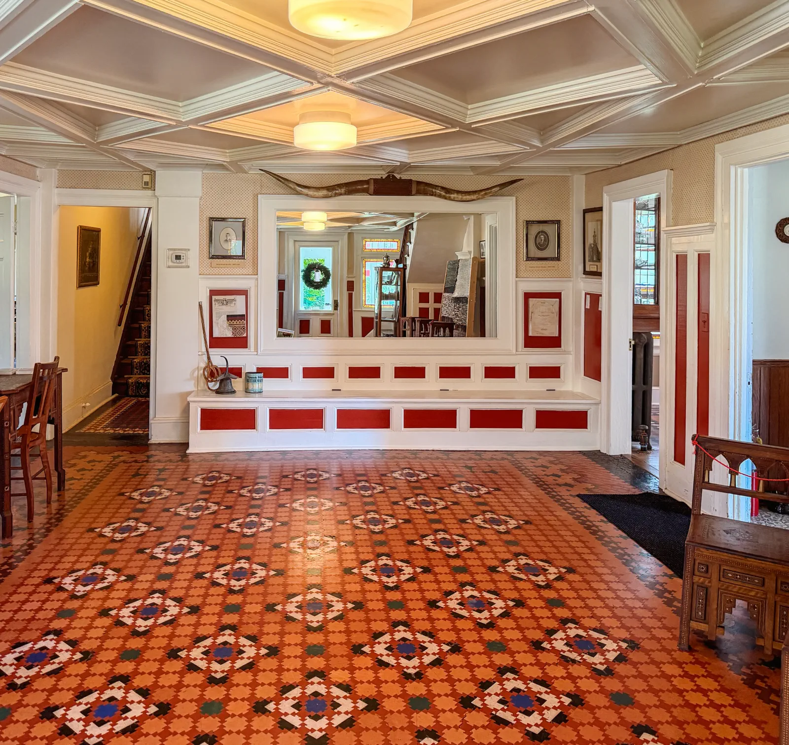 Meeting room inside the Boothe Homestead with its patterned puzzle floor