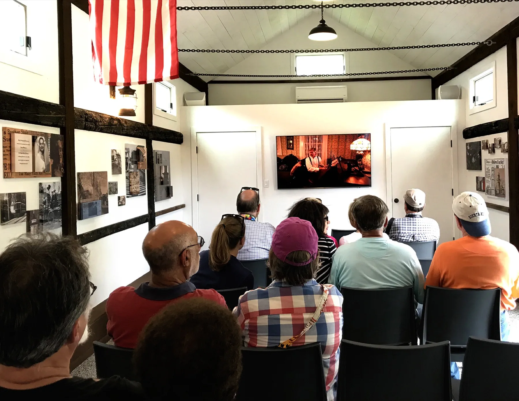 Visitors gathered for an orientation program inside the Boothe Park Visitor Center